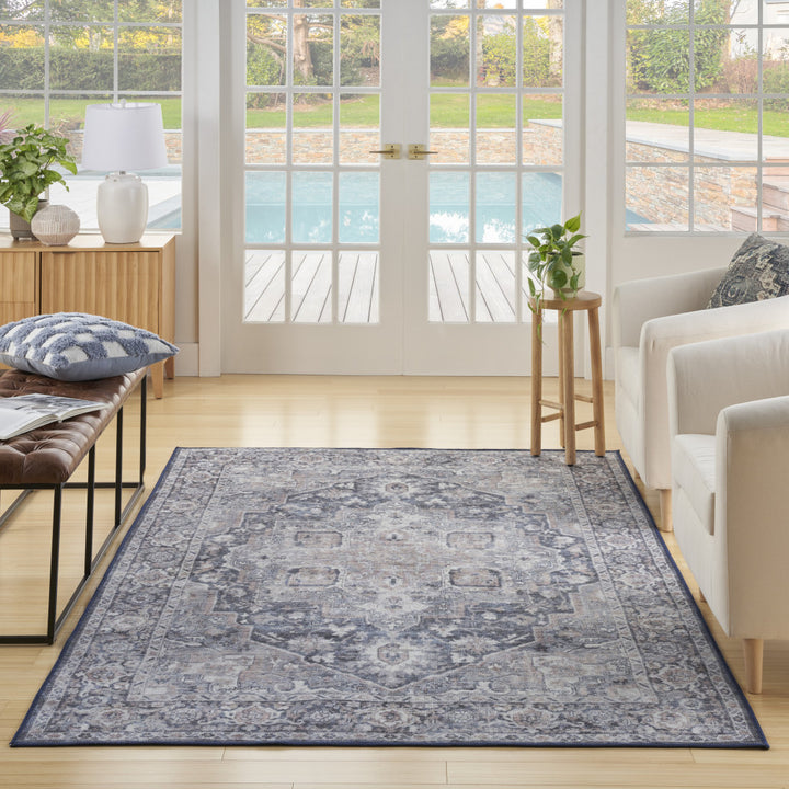 6' X 9' Blue And Pink Floral Power Loom Distressed Washable Area Rug