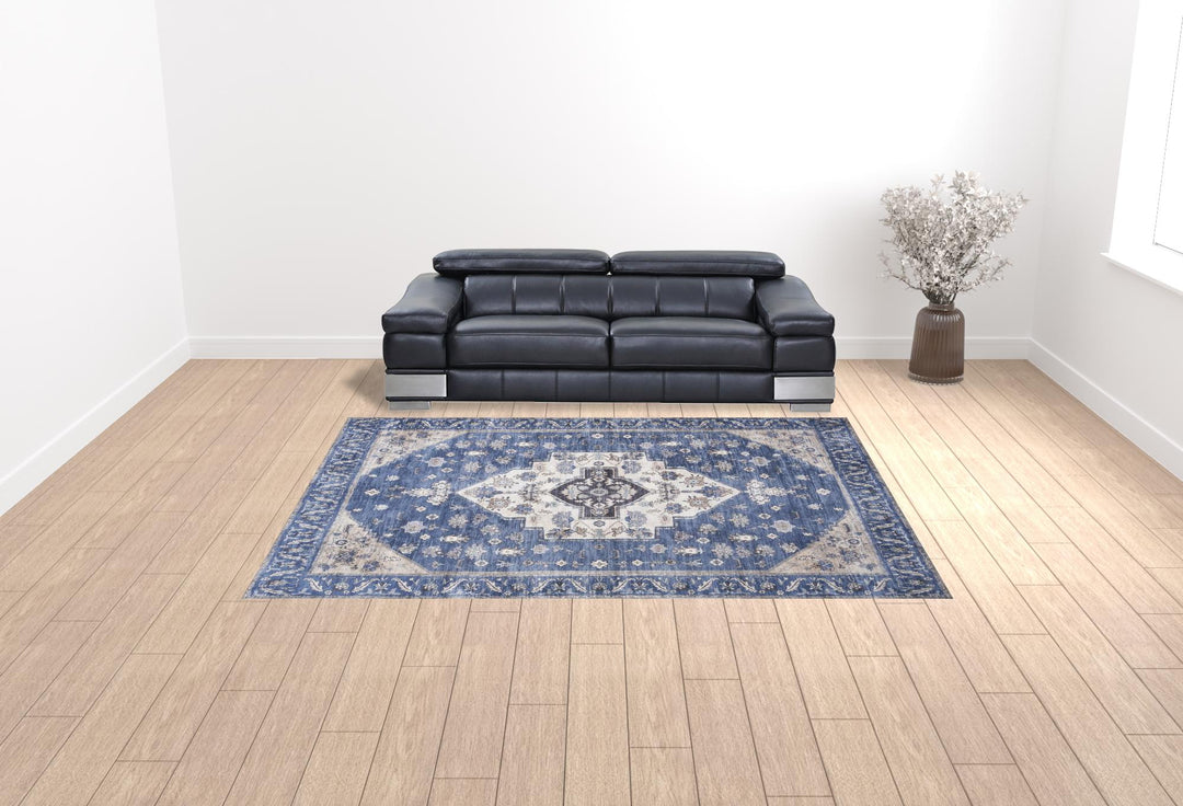 9' x 12' Blue and Ivory Oriental Power Loom Distressed Washable Non Skid Area Rug