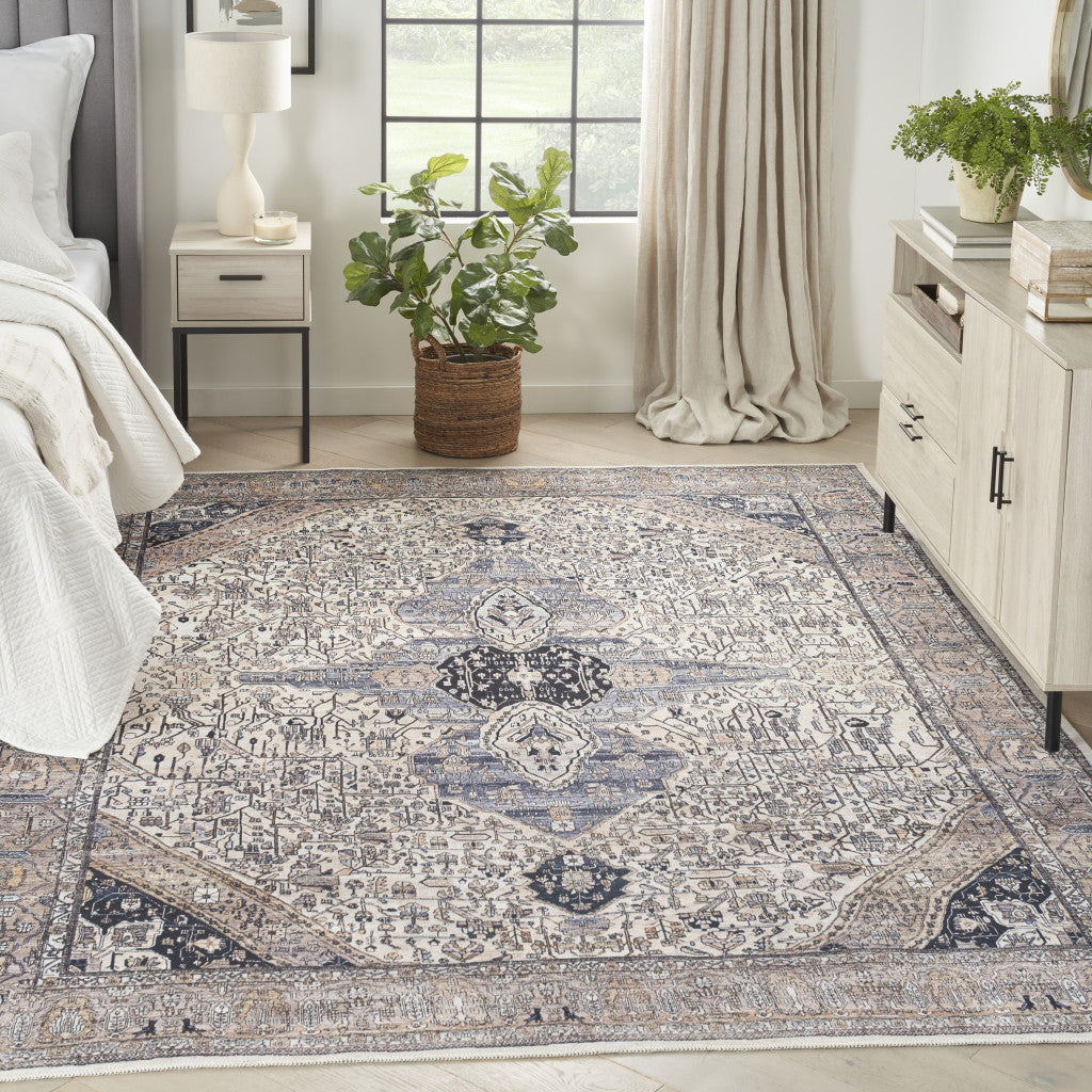 9' x 12' Ivory and Blue Oriental Power Loom Distressed Washable Non Skid Area Rug