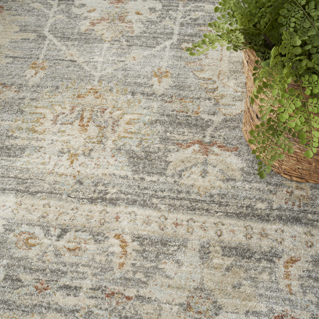 8' x 10' Beige Ivory and Gray Oriental Power Loom Distressed Area Rug With Fringe