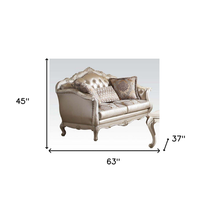 63" Rose Gold And Pearl Faux Leather Curved Loveseat and Toss Pillows