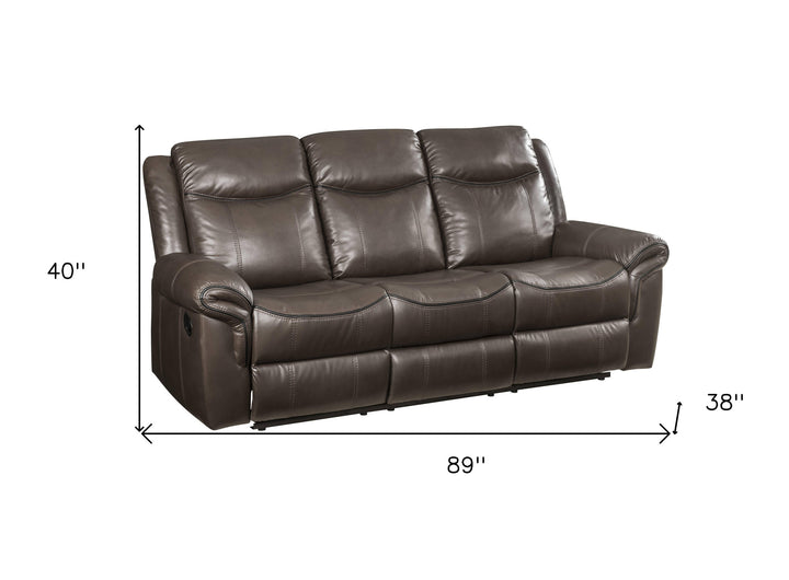 89" Brown And Black Faux Leather Reclining USB Sofa