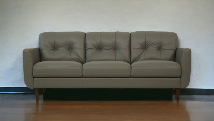 83" Green Leather And Black Sofa