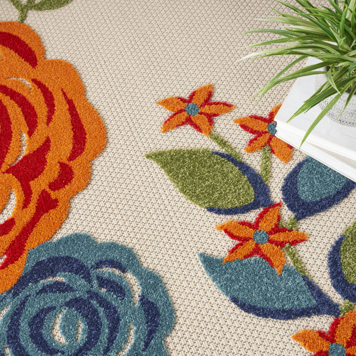 8' Blue and Orange Round Floral Power Loom Area Rug