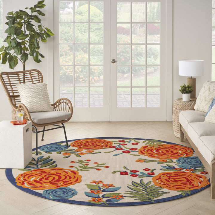 8' Blue and Orange Round Floral Power Loom Area Rug