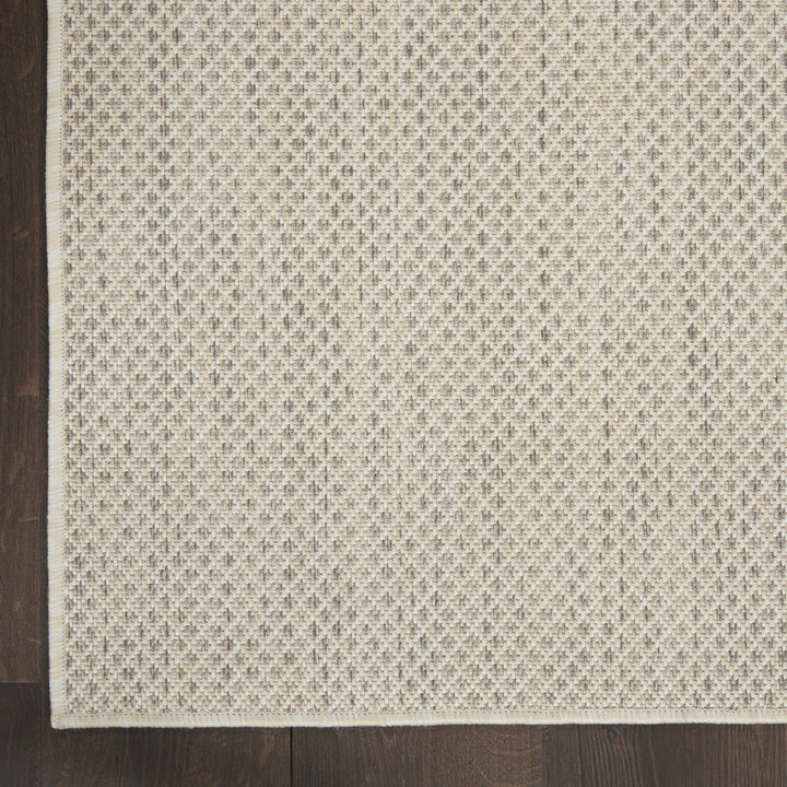 7' x 10' Ivory Geometric Power Loom Area Rug