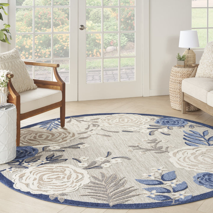 8' Blue and Orange Round Floral Power Loom Area Rug