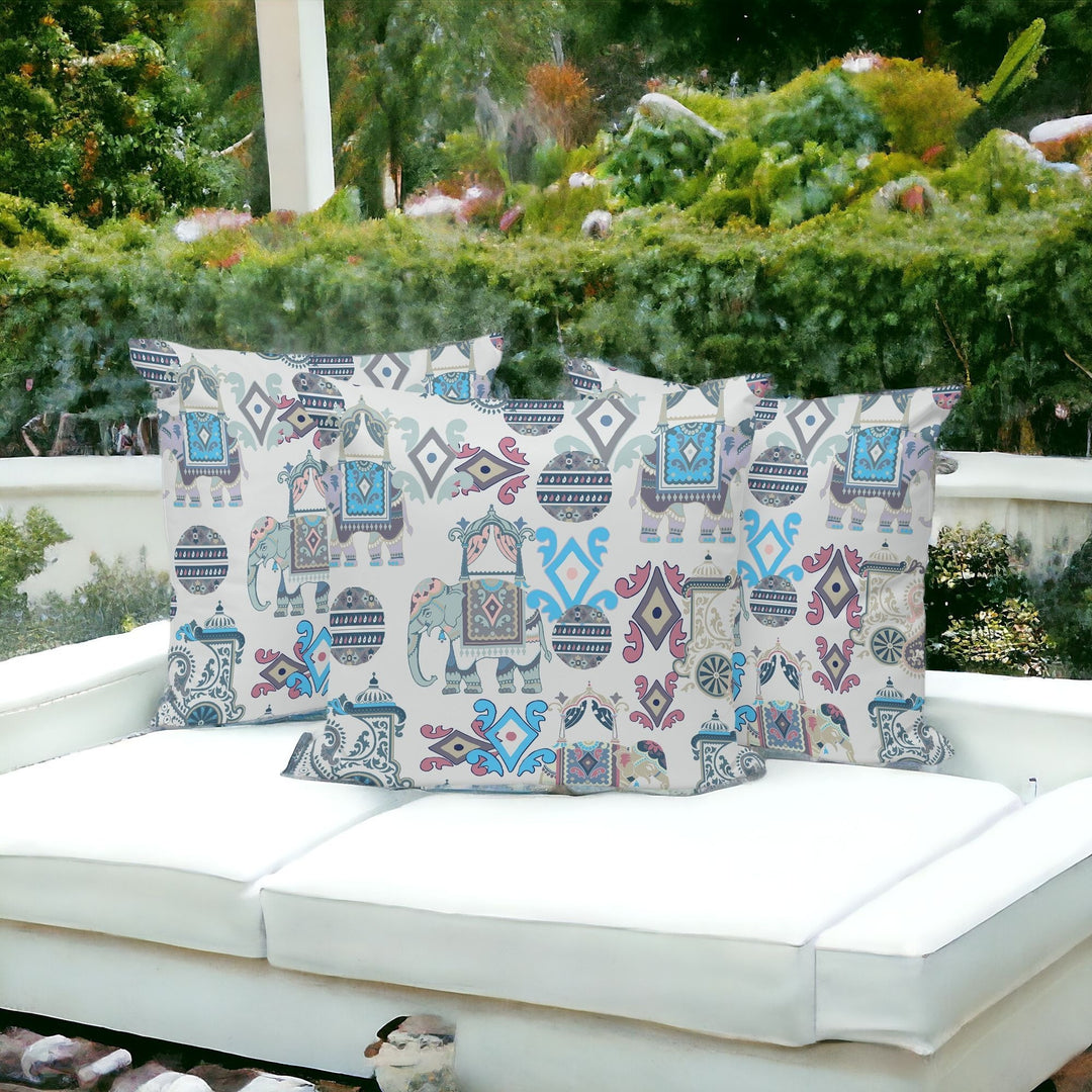 Set of Three 16" X 16" Beige and Blue Elephant Abstract Indoor Outdoor Throw Pillow