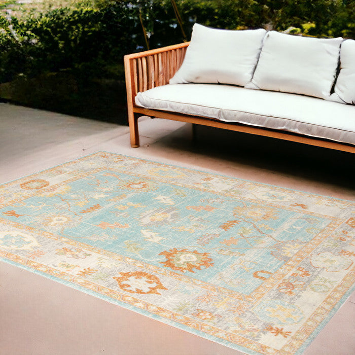 9' x 12' Blue and Orange Floral Stain Resistant Indoor Outdoor Area Rug