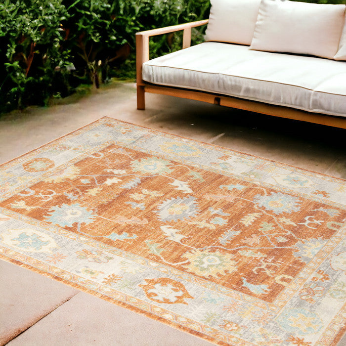 8' x 10' Blue and Orange Floral Stain Resistant Indoor Outdoor Area Rug