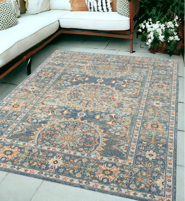 5' x 7' Blue and Orange Floral Medallion Stain Resistant Indoor Outdoor Area Rug