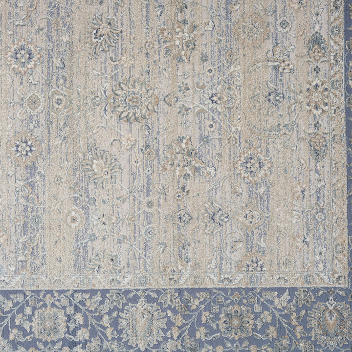 9' x 12' Blue and Beige Floral Area Rug