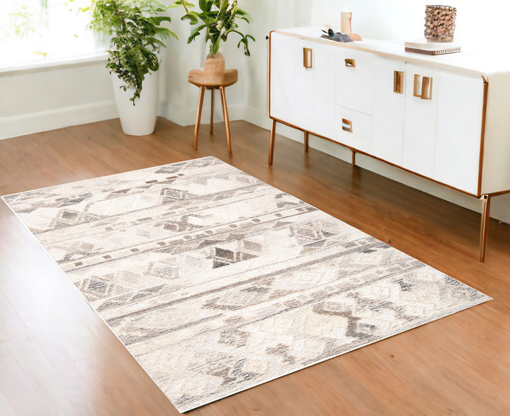 4' x 6' Beige Ivory and Gray Geometric Hand Tufted Distressed Area Rug