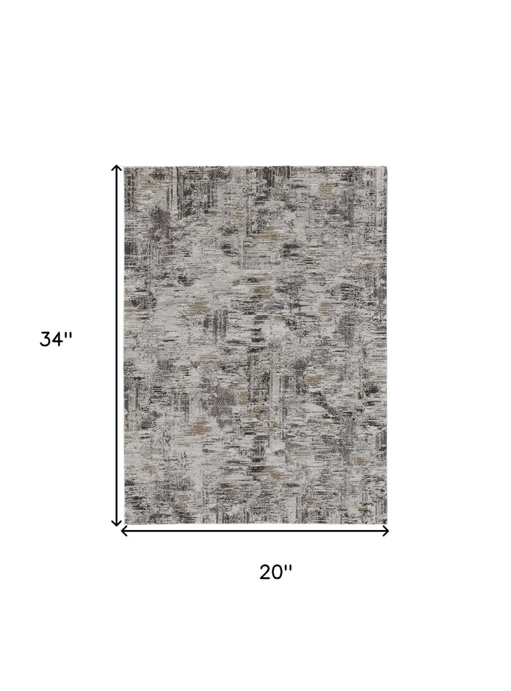 2' x 3' Brown and Ivory Abstract Power Loom Distressed Area Rug