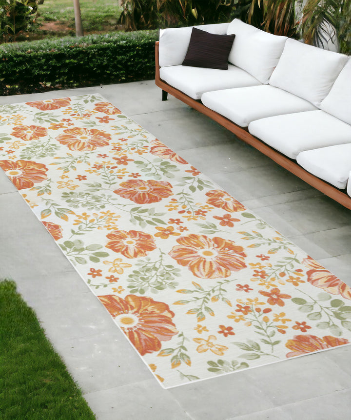 2' X 8' Ivory Green and Orange Floral Stain Resistant Indoor Outdoor Runner Rug