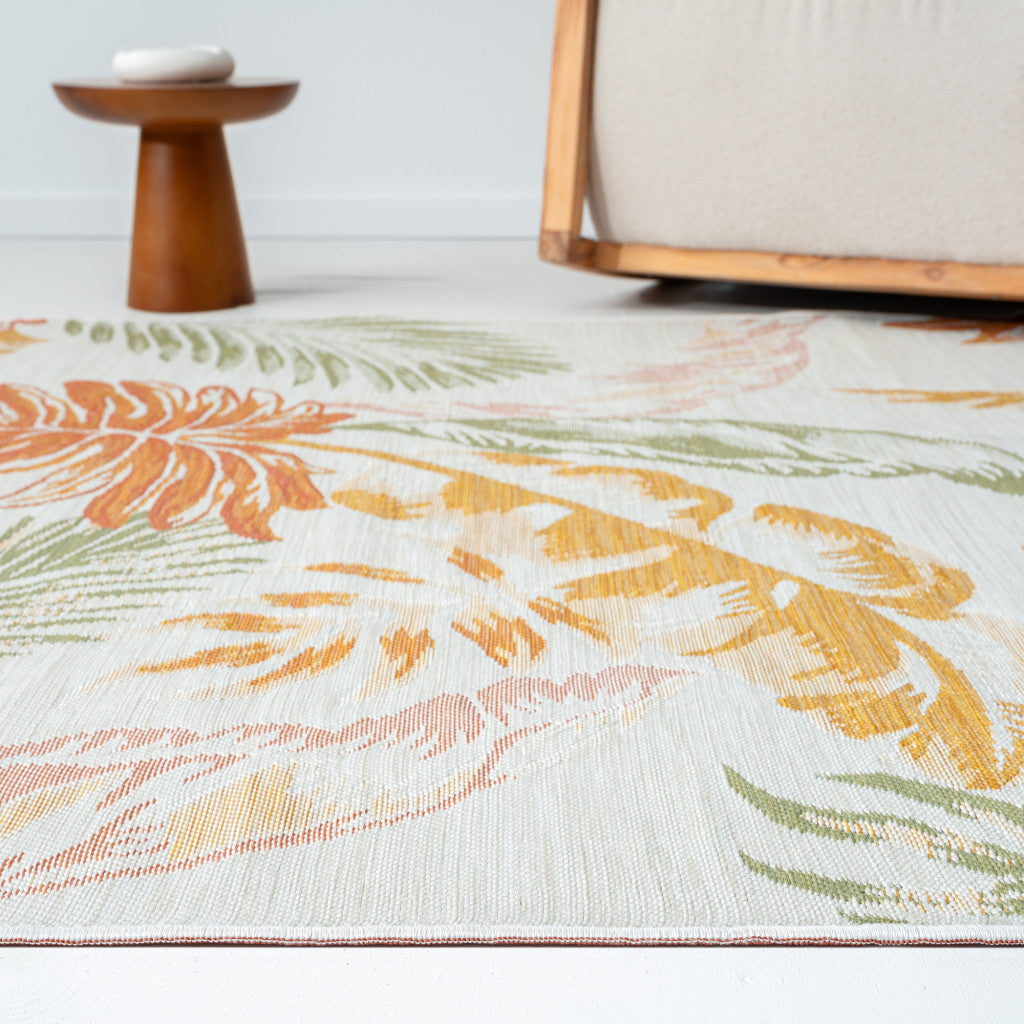 8' x 10' Ivory Green and Orange Palm Leaf Stain Resistant Indoor Outdoor Area Rug