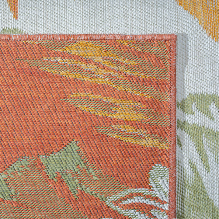 5' x 7' Ivory Green and Orange Palm Leaf Stain Resistant Indoor Outdoor Area Rug