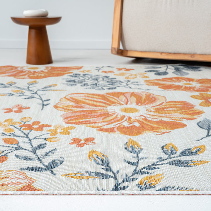 5' x 7' Ivory Orange and Blue Floral Stain Resistant Indoor Outdoor Area Rug