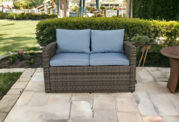 Six Piece Outdoor Gray Wicker Sofa Seating Group with Light Blue Cushions