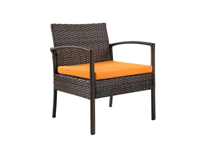 Four Piece Outdoor Brown Wicker Sofa Seating Group with Orange Cushions