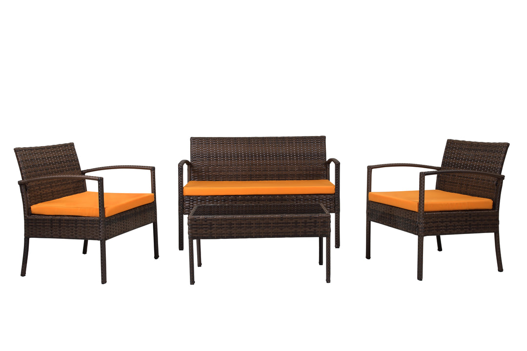 Four Piece Outdoor Brown Wicker Sofa Seating Group with Orange Cushions