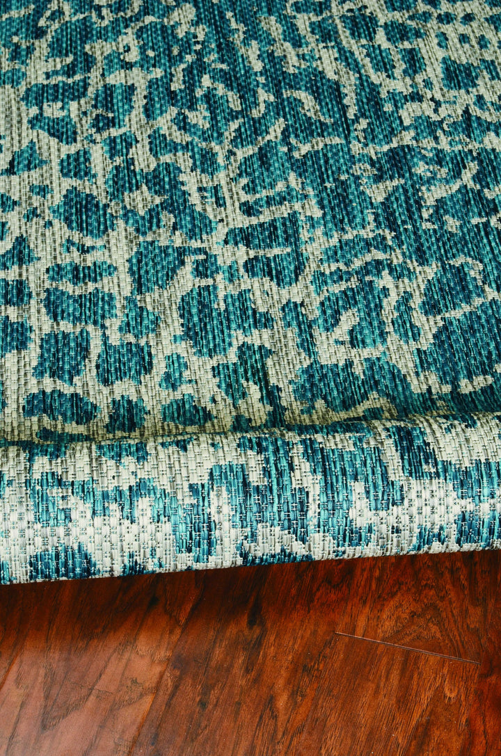 5' X 8' Teal Animal Print Outdoor Area Rug