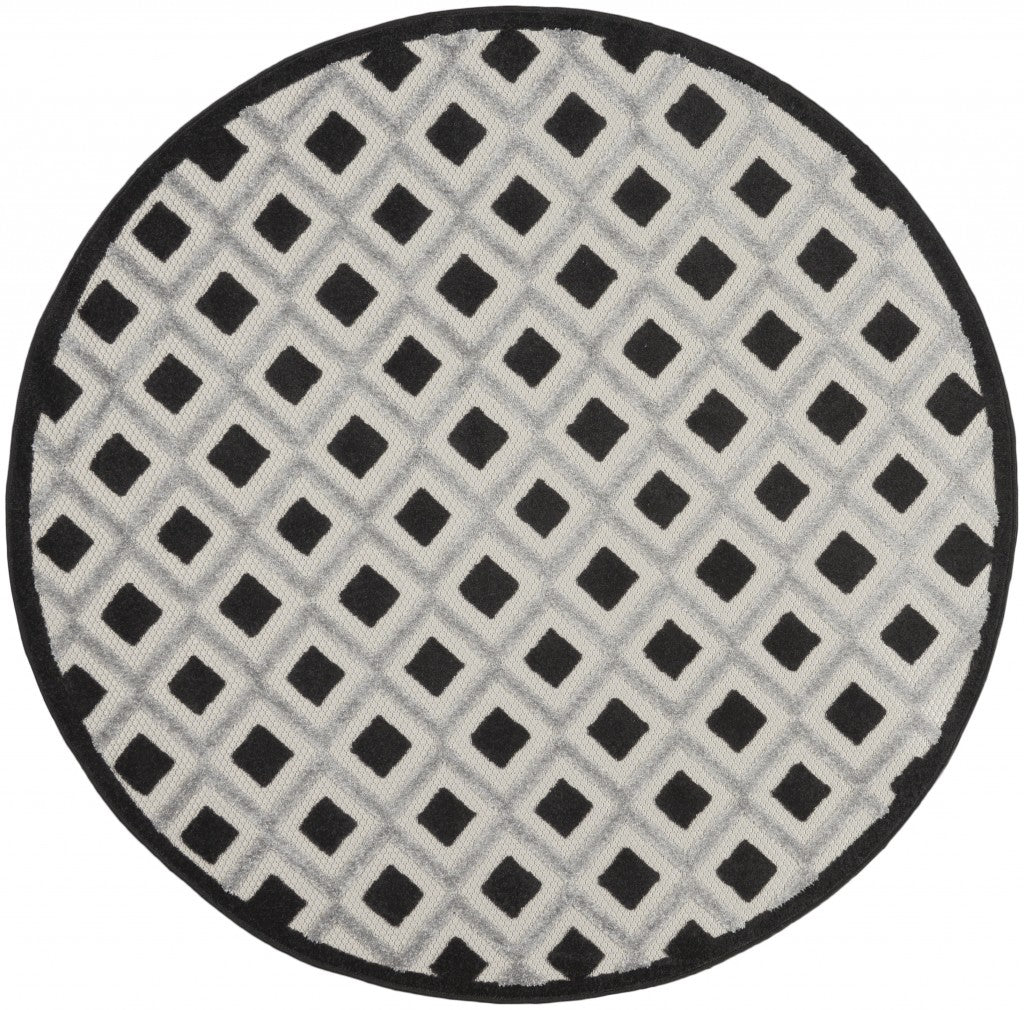 4' Round Black And White Round Geometric Indoor Outdoor Area Rug