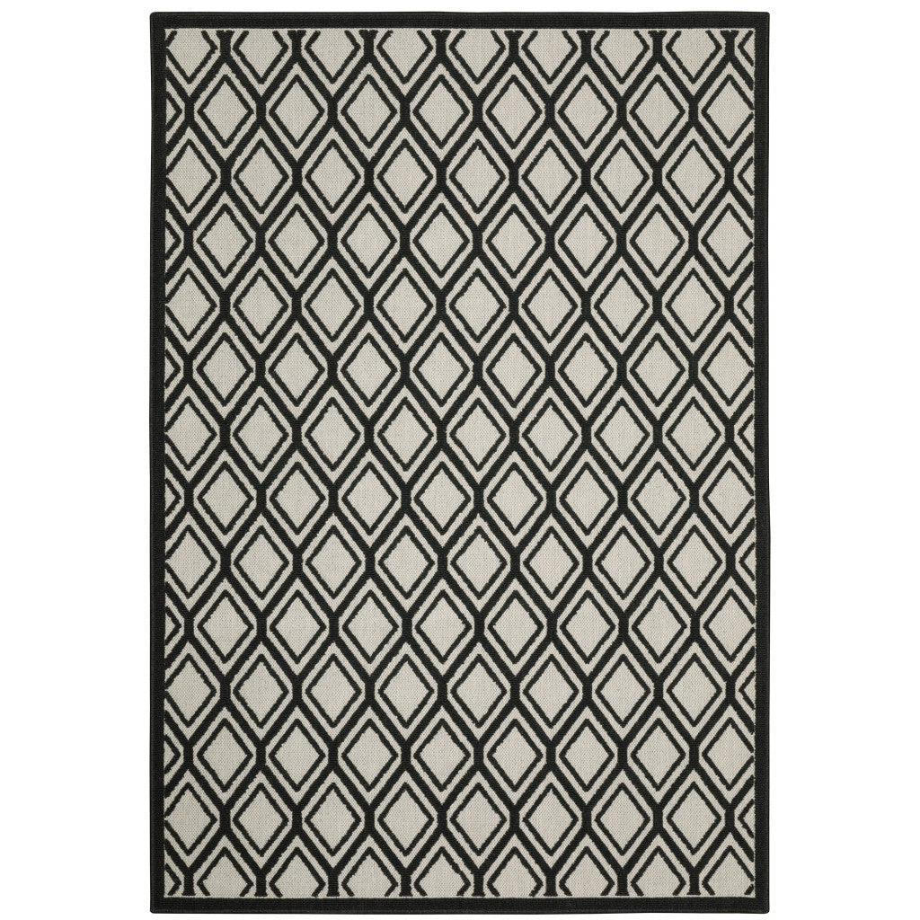 5' X 7' Beige Geometric Stain Resistant Indoor Outdoor Area Rug