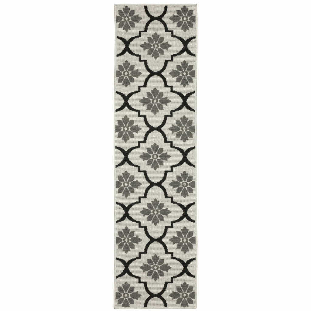 2' X 7' Beige Geometric Stain Resistant Indoor Outdoor Area Rug