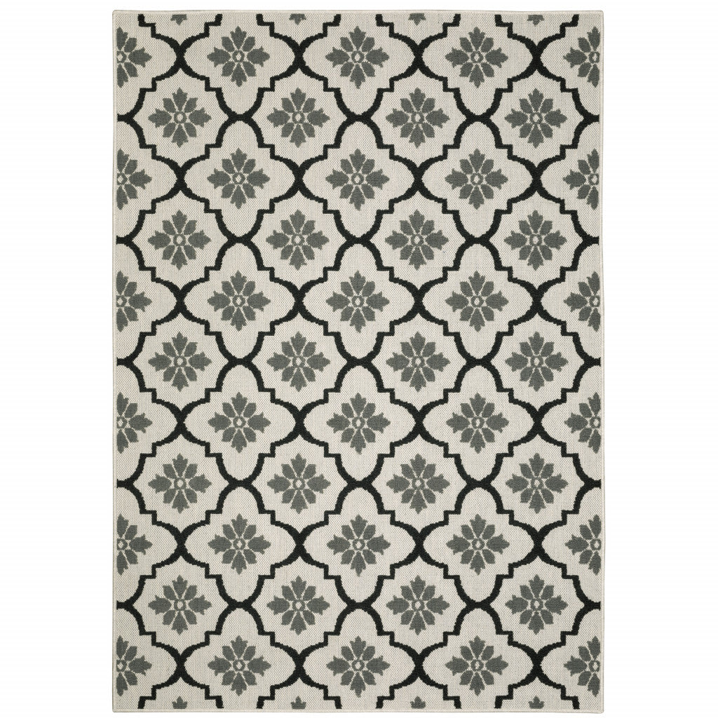 5' X 7' Beige Geometric Stain Resistant Indoor Outdoor Area Rug